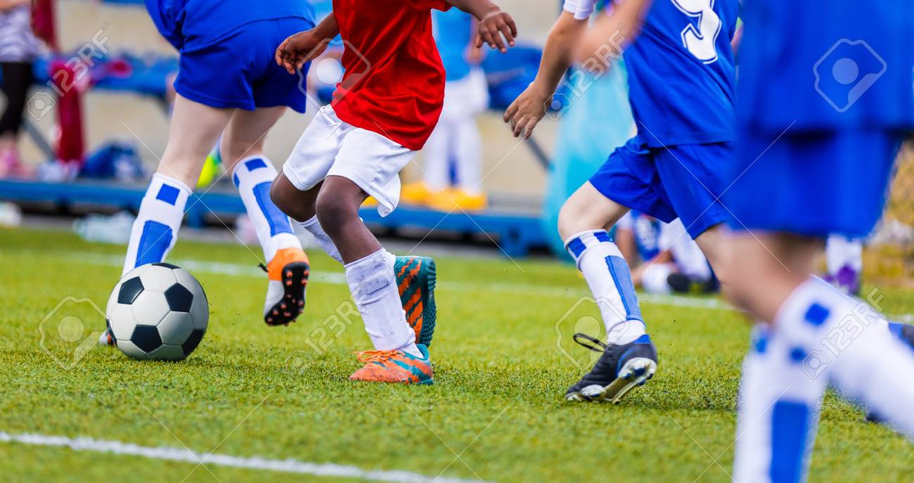 boys red soccer cleats