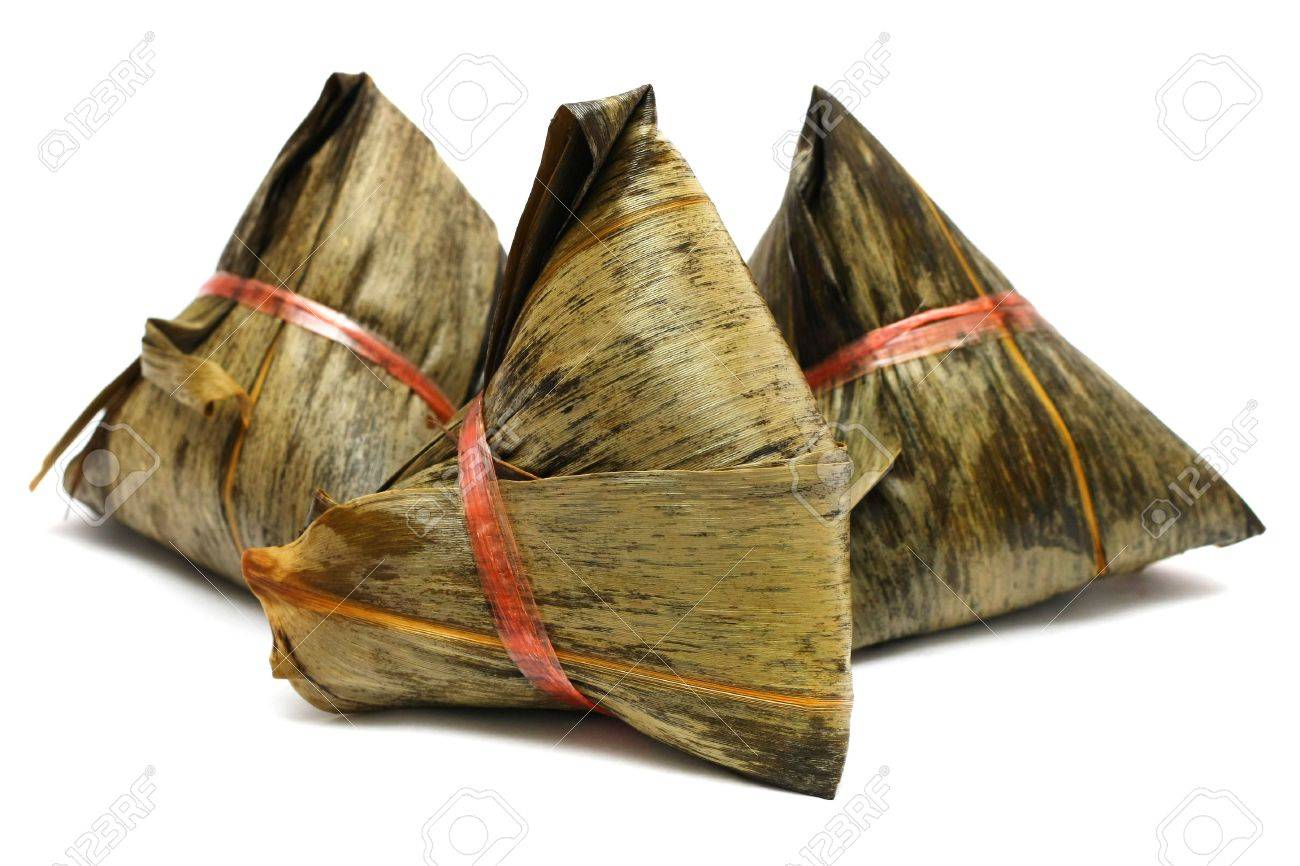 Three rice dumplings (Chinese traditional food) on white background. - 3058381 Three rice dumplings (Chinese traditional food) on white background. - 3058381