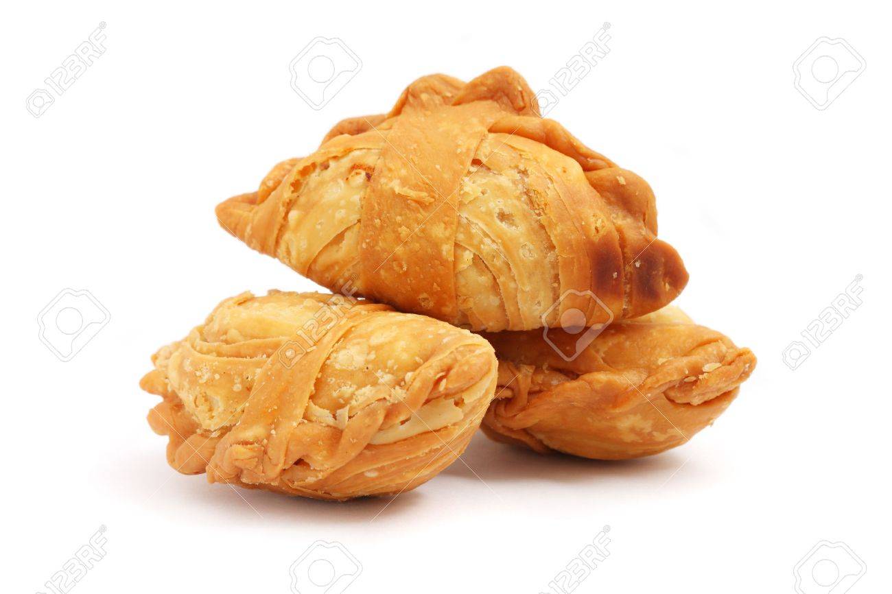 Three curry puffs isolated on white background. - 4981675 Three curry puffs isolated on white background. - 4981675