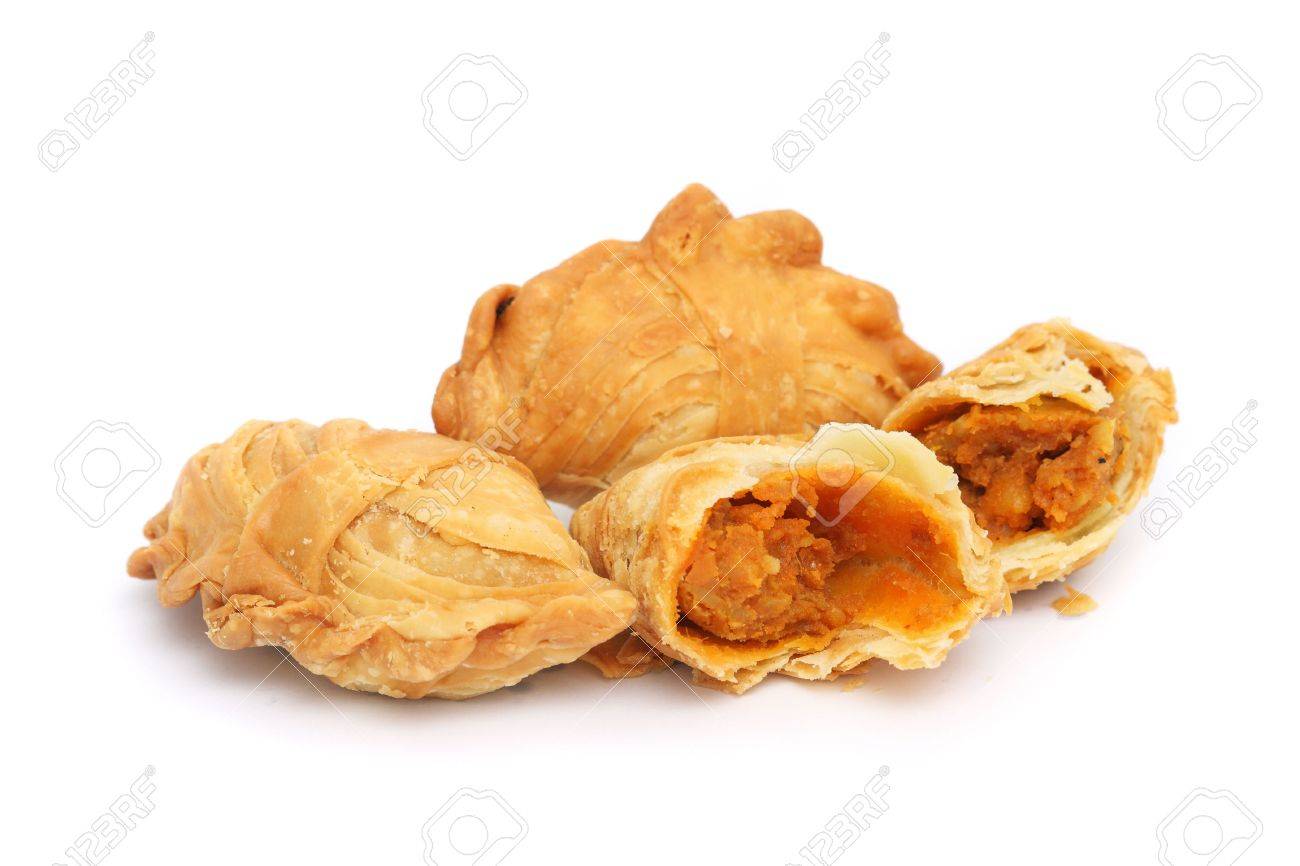 Three curry puffs isolated on white background. - 4981674 Three curry puffs isolated on white background. - 4981674