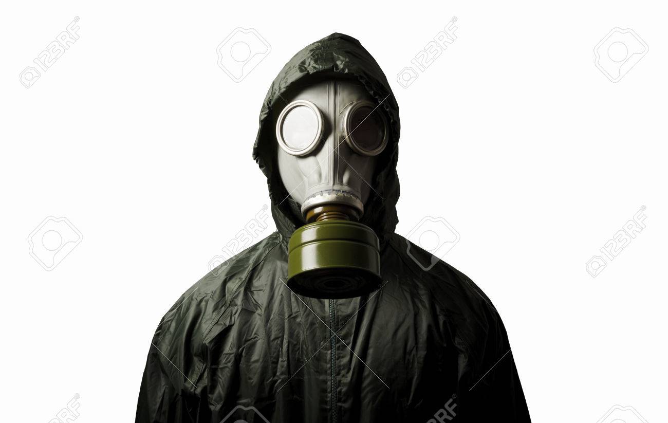 男は彼の顔にガスマスクを身に着けています。白い背景の防毒マスクの写真素材・画像素材 Image 72065927