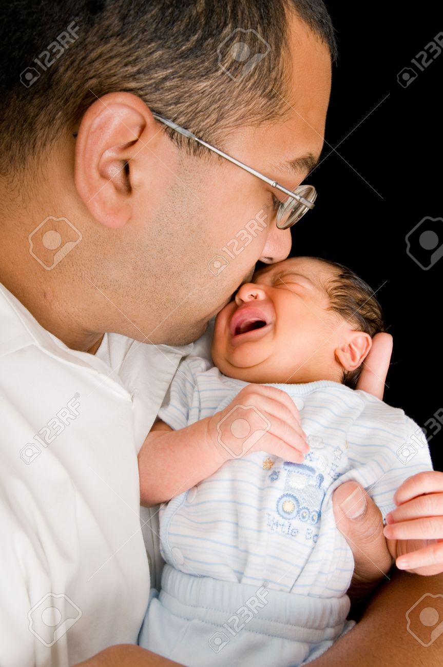 baby cries with dad