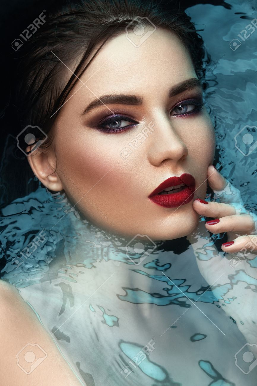 Beauty Portrait In Water Fashion Vogue Style Shoot Close Up Makeup Stock Photo Picture And Royalty Free Image Image 58768457