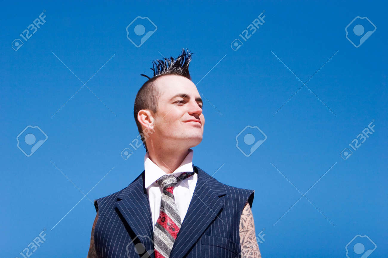 Man With Mohawk Style Haircut And Alternative Fashion Outfit