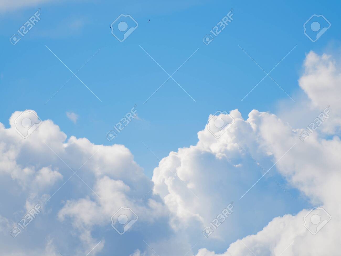 Beautiful Sunny Sky With Clouds. The Weather Is Partly Cloudy. Stock Photo,  Picture and Royalty Free Image. Image 131936335.