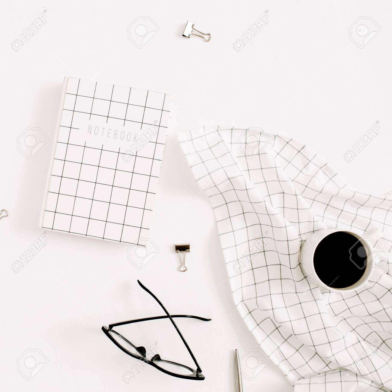 stylized home office desk with calendar diary glasses and coffee office calender