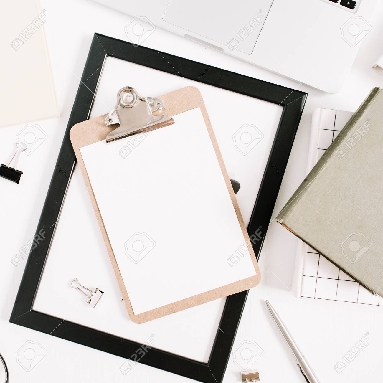 modern home office desktop with laptop clipboard pen book modern clipboard