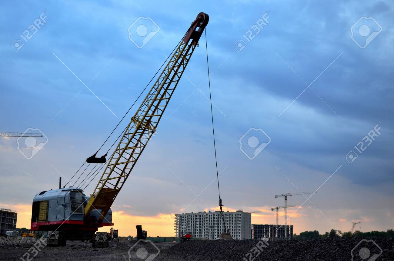 Large Crawler Crane Or Dragline Excavator With A Heavy Metal Wrecking Ball  On A Steel Cable. Wrecking Balls At Construction Sites. Dismantling And  Demolition Of Buildings And Structures - Image Stock Photo,, image size:1300x861