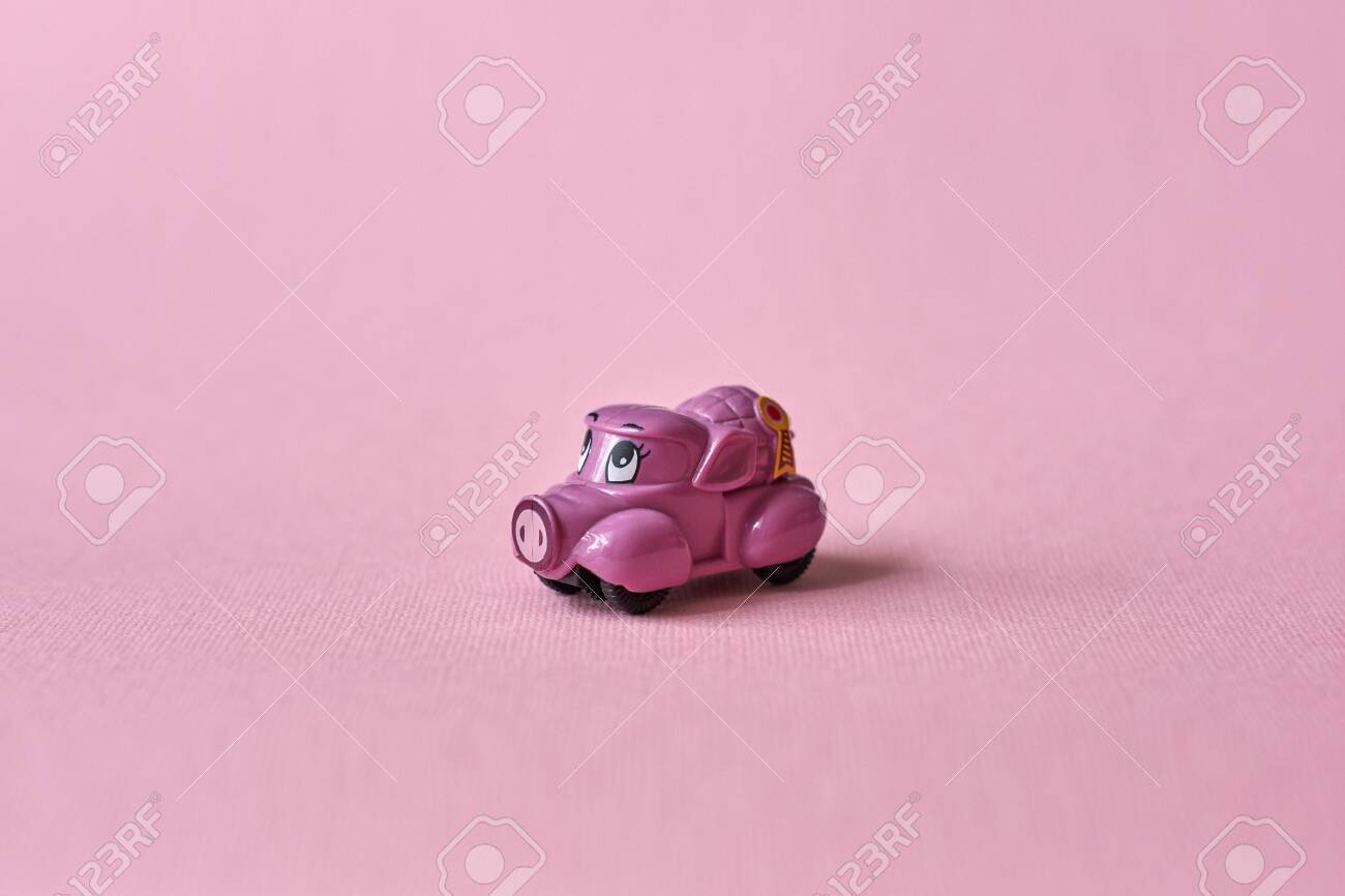 pink toy cars and trucks