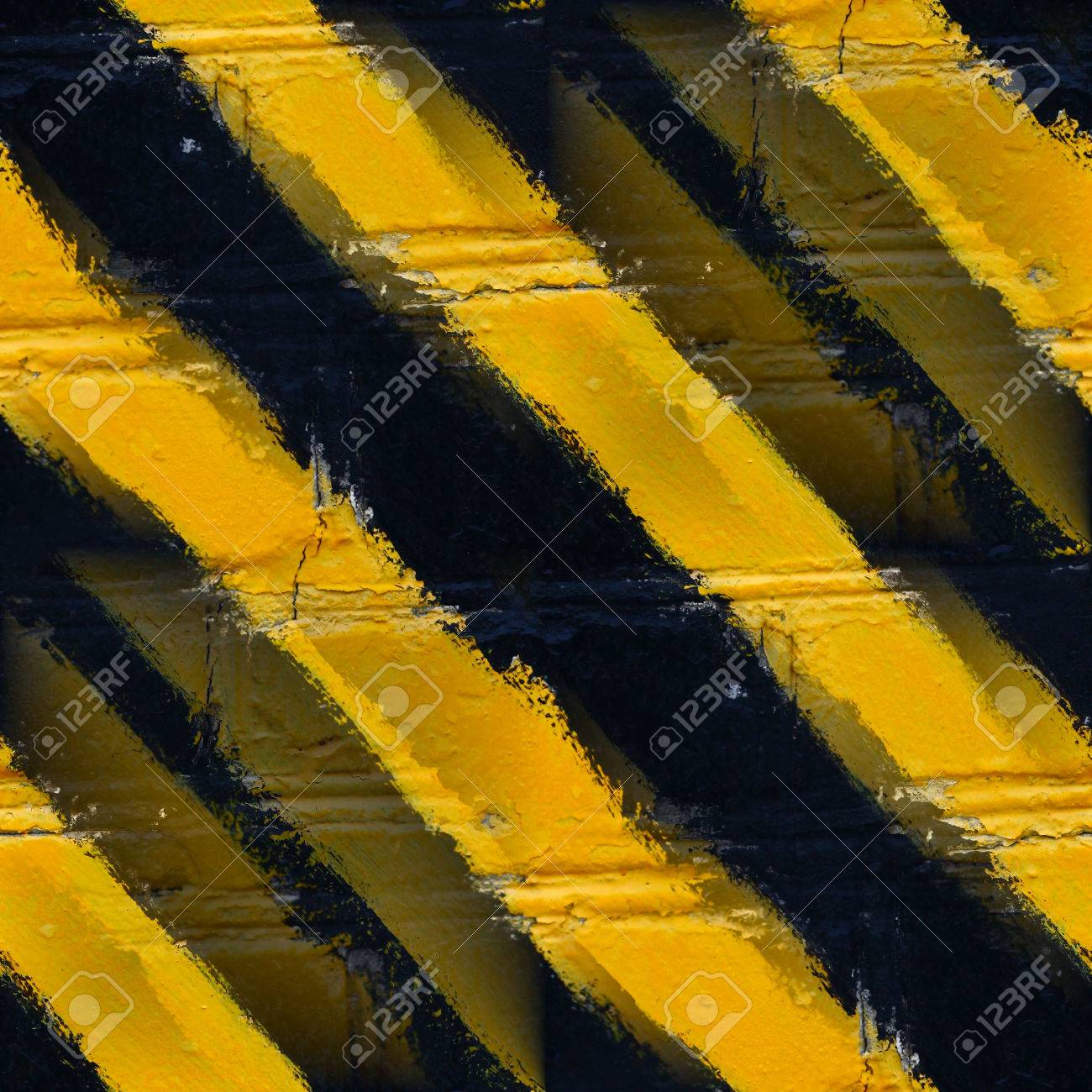 シームレスな黄色の黒のストライプの石の壁の壁紙 の写真素材 画像素材 Image