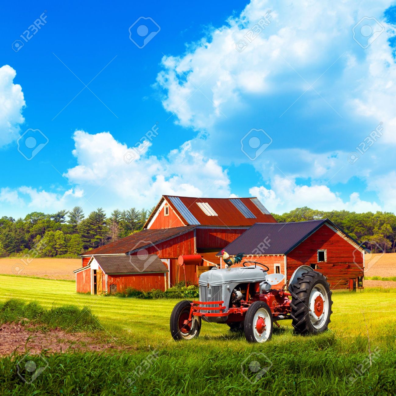 american traditional country farm with blue cloudy sky stock photo