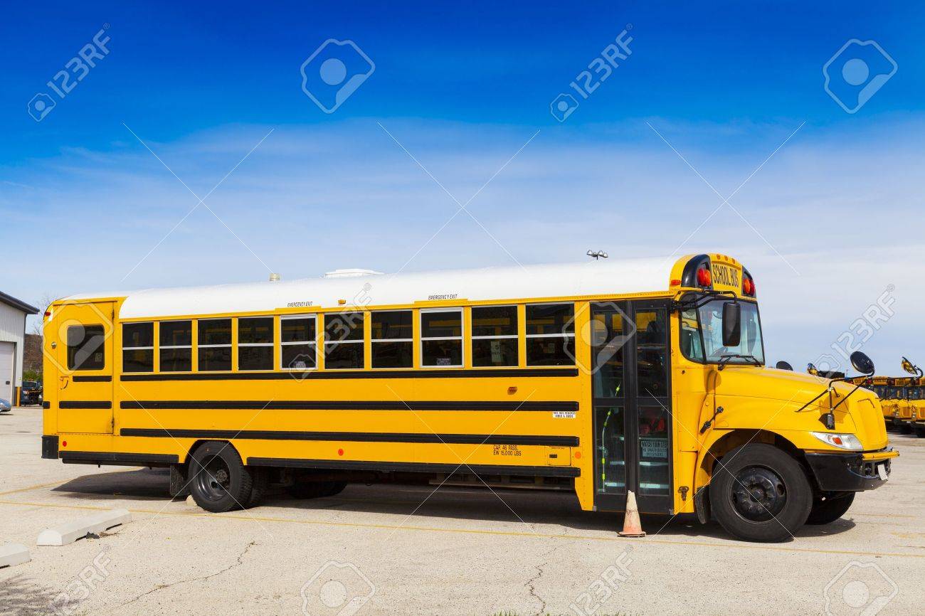 yellow school bus with blue sky stock photo picture and royalty