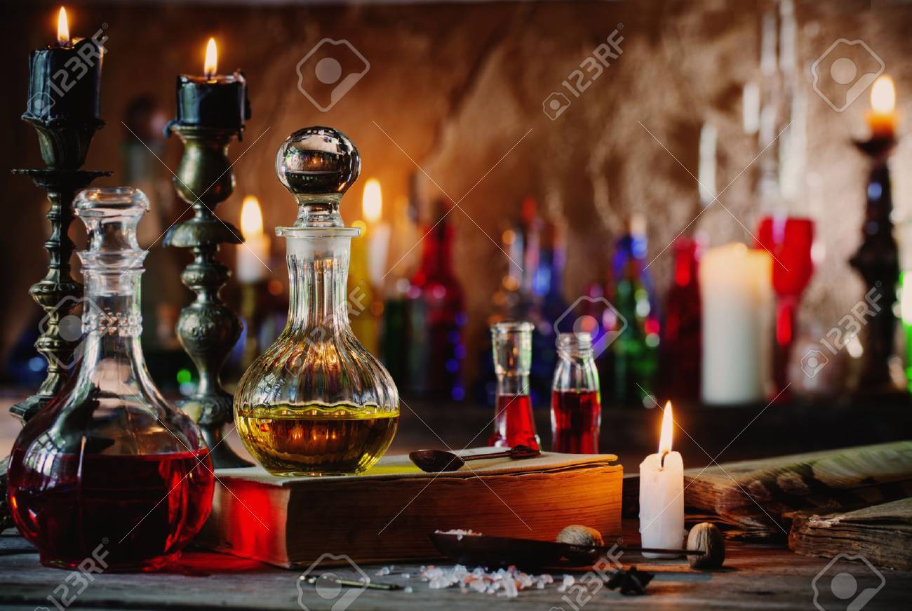 Magic potion, ancient books and candles - 83473140 Magic potion, ancient books and candles - 83473140