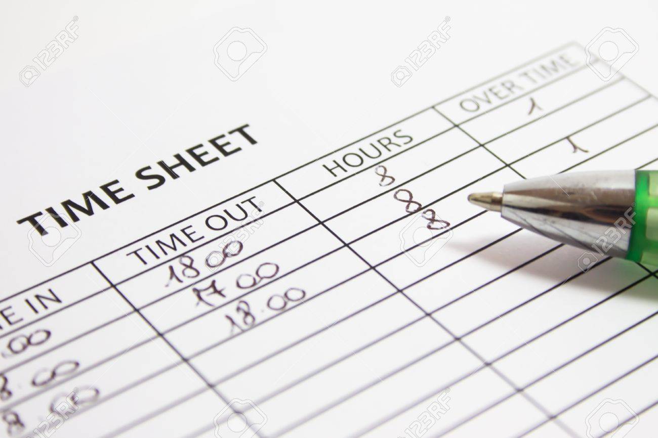 filling time sheet with hours stock photo picture and royalty free hours sheet