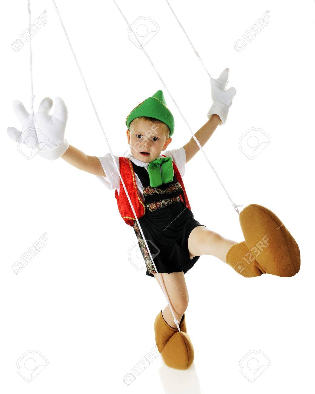 an adorable live preschool pinocchio marionette dancing strings