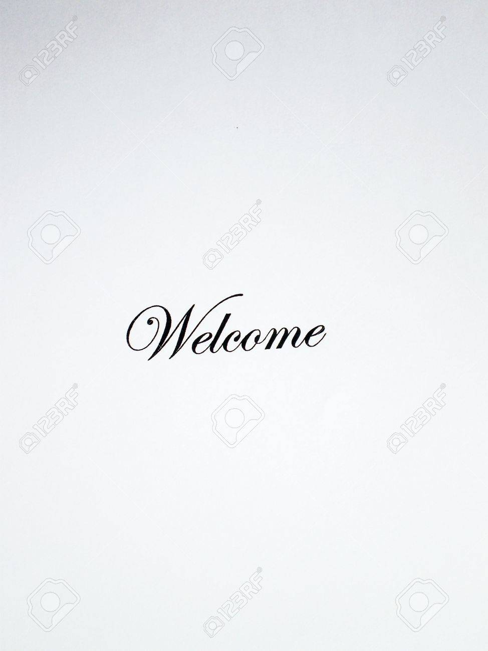 close up view of the word welcome written in a classic type on the word classic