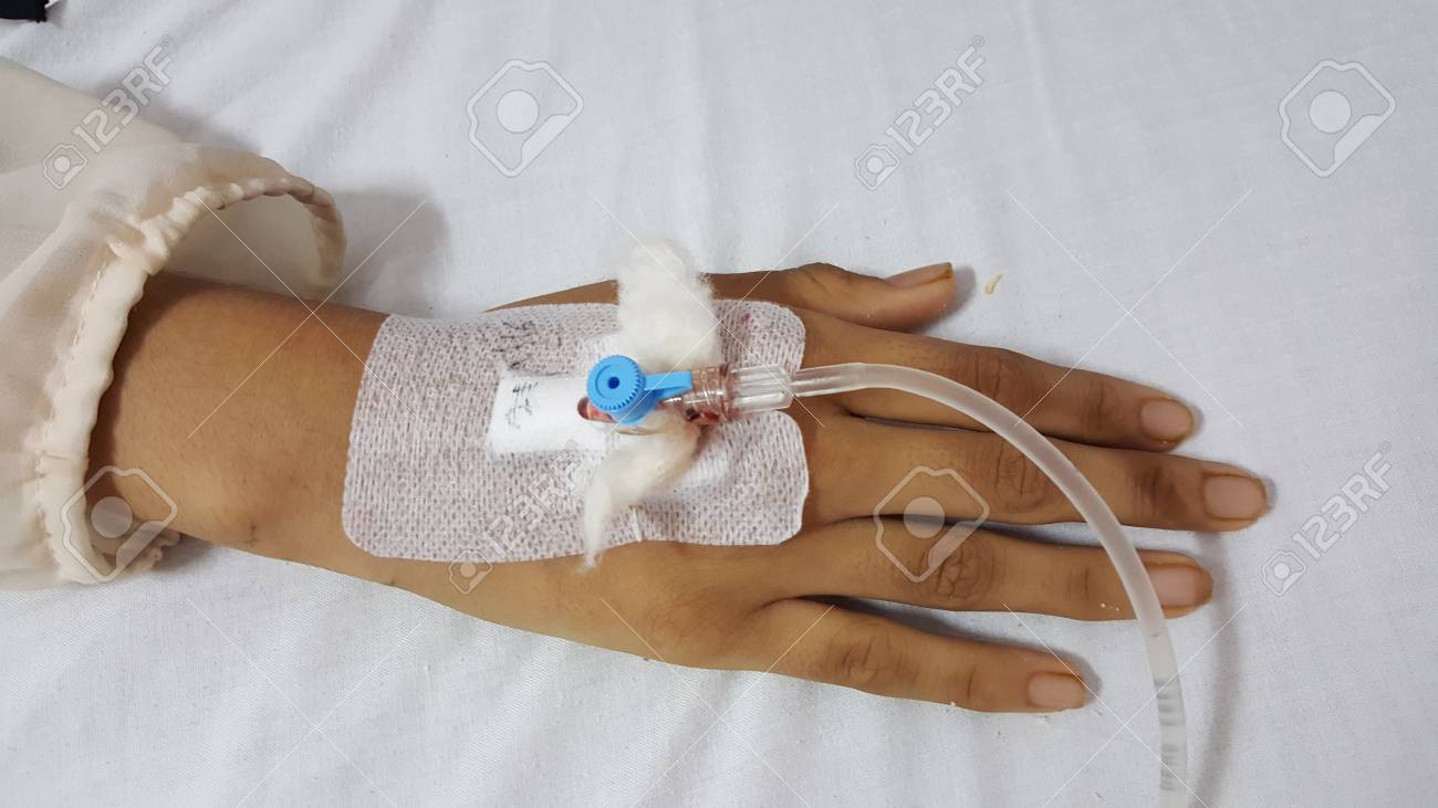 Glucose Drip Inserted In Patient's Hand. Stock Photo, Picture and Royalty  Free Image. Image 66650747.