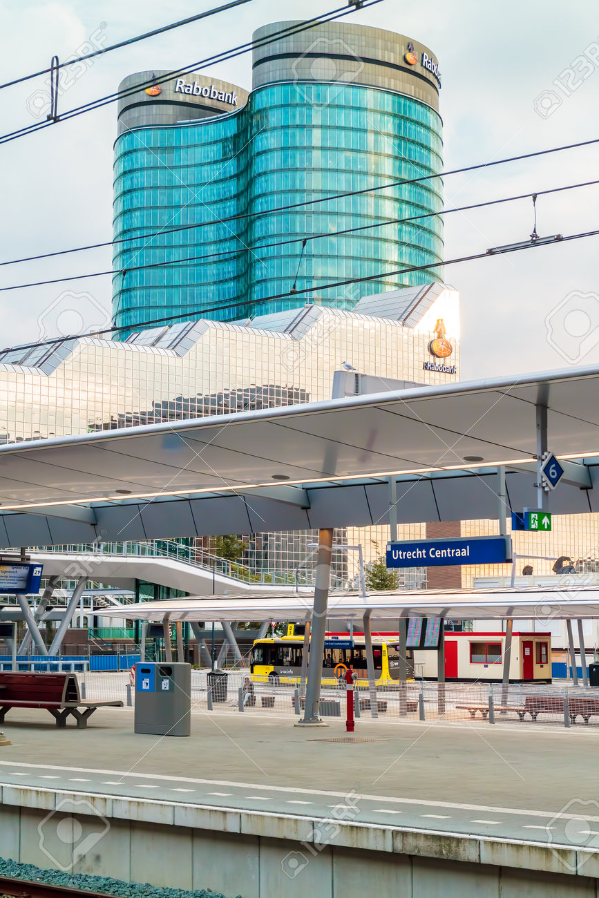 Stock Photo - UTRECHT, THE NETHERLANDS – AUGUST 16, 2017: Utrecht central train station with the Dutch international Rabobank Group headquarters in Utrecht, ...