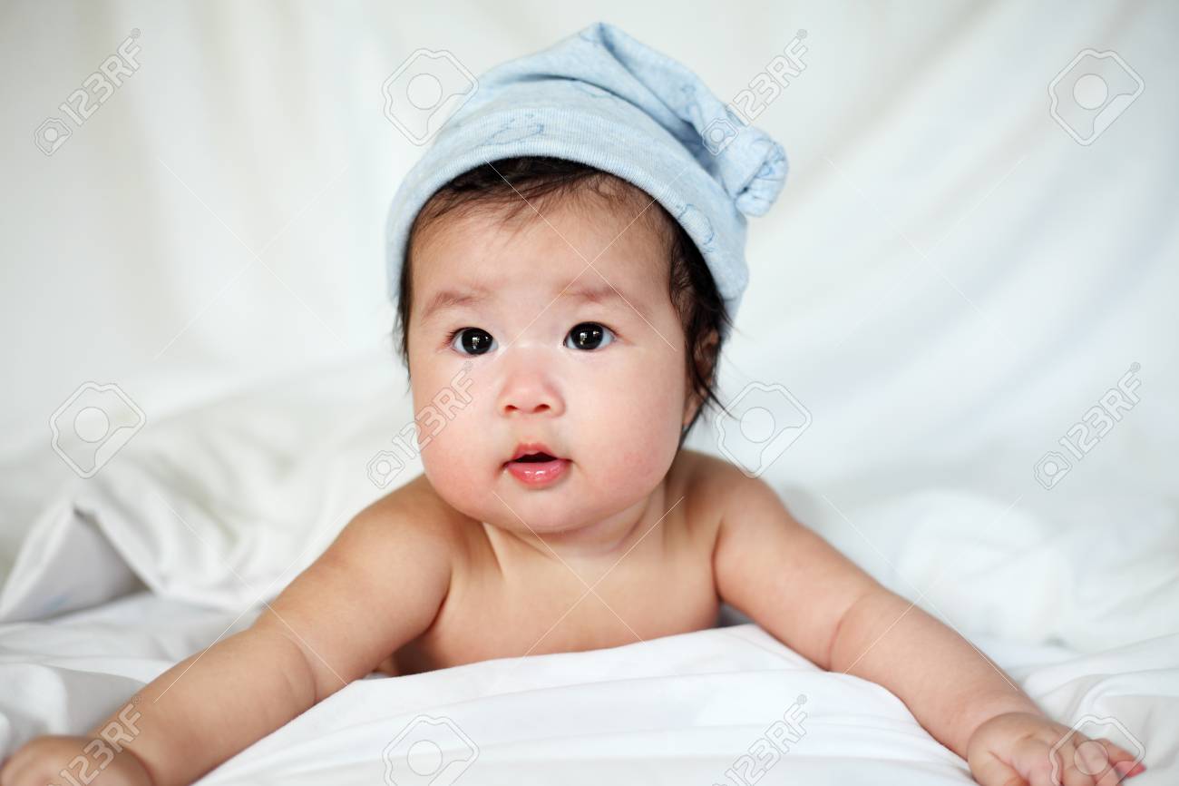 white newborn baby hat