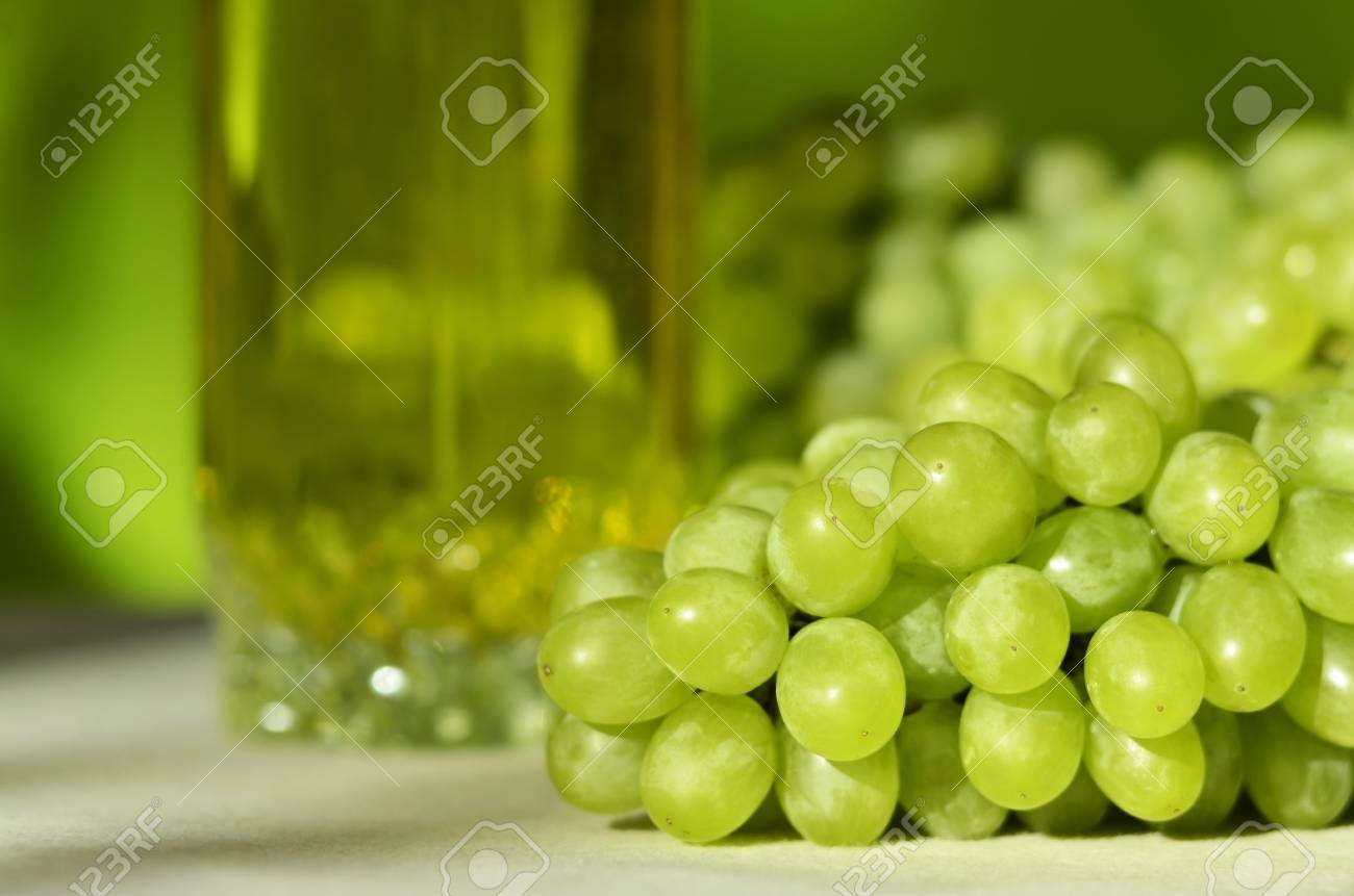 Download Yellow Grape Juice And Bunches Of Green Grapes Stock Photo Picture And Royalty Free Image Image 126651645 Yellowimages Mockups
