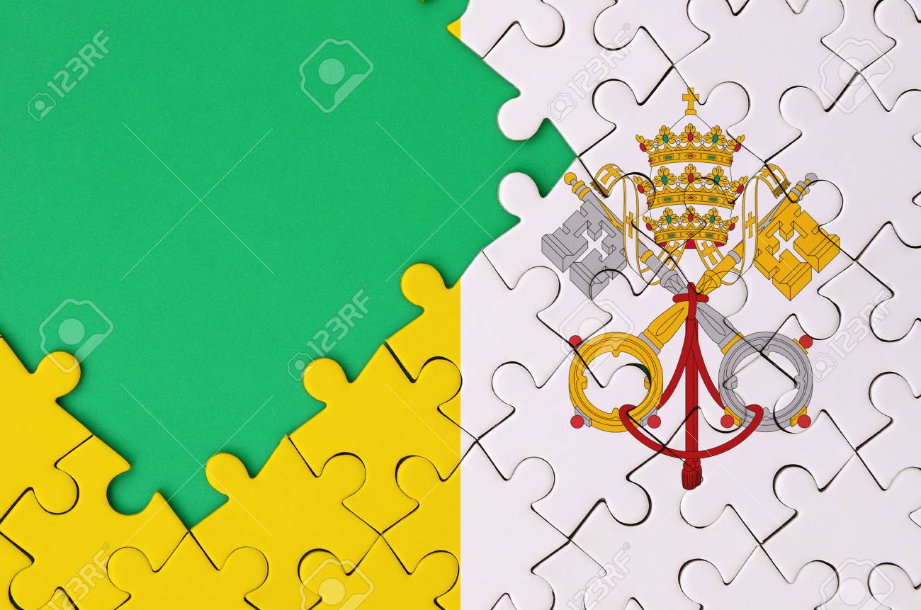 Stock P O Vatican City State Flag Is Depicted On A Completed Jigsaw Puzzle With Free Green Copye On The Left Side Stock P O Vatican City State Flag Is Depicted On A Completed Jigsaw Puzzle With Free Green Copye On The Left Side