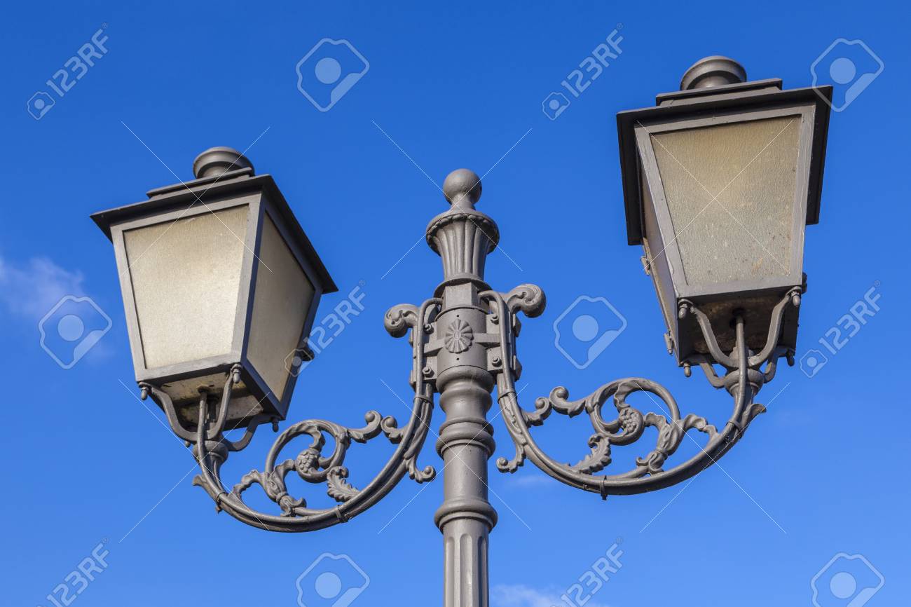 old vintage lantern under blue sky symbolize good former times - 97331706 old vintage lantern under blue sky symbolize good former times - 97331706