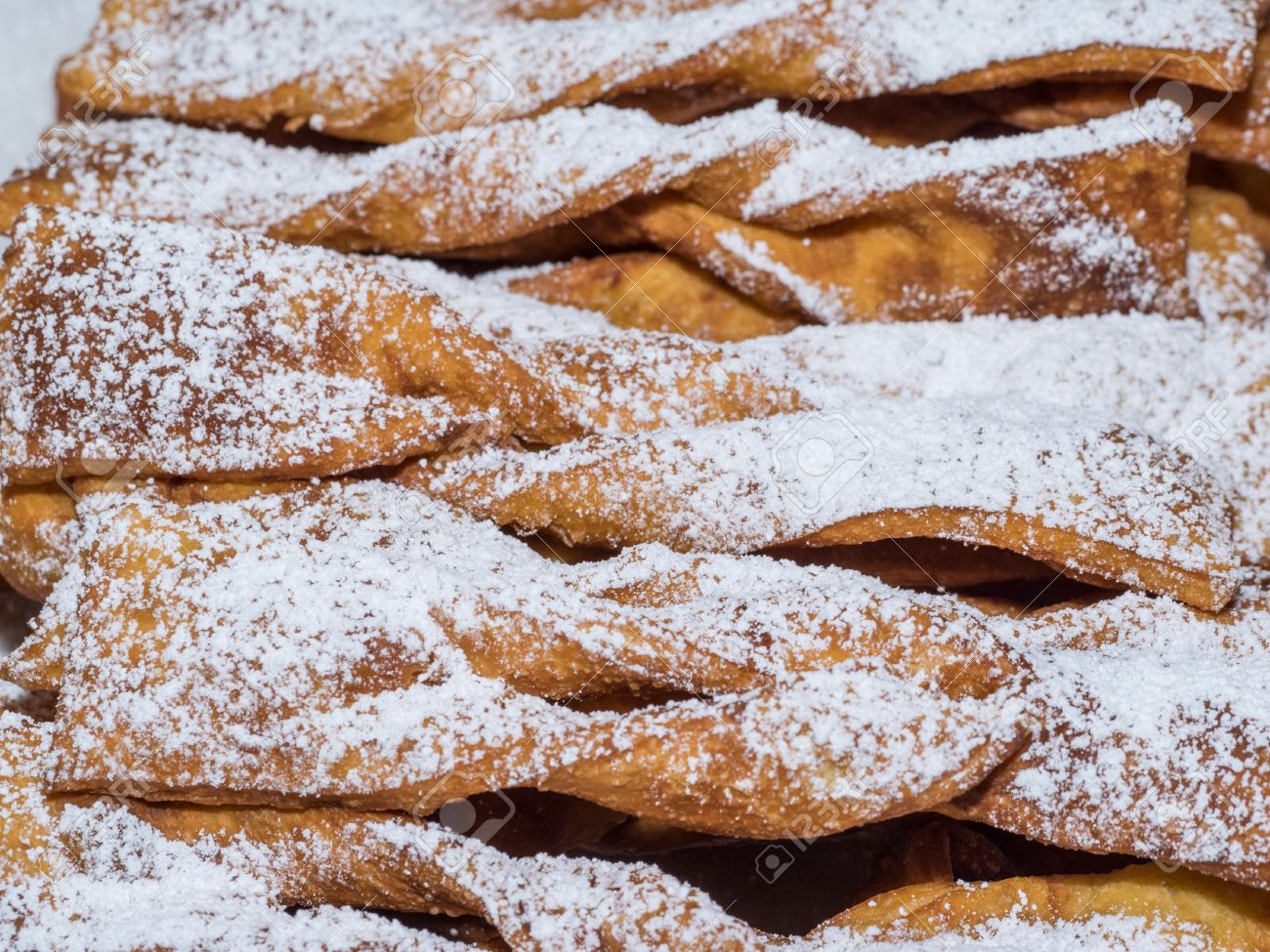 Angel Wings Are A Traditional Sweet Crisp Pastry Made Out Of Dough That Has Been Shaped Into Thin Twisted Ribbons Deep Fried And Sprinkled With Powdered Sugar Stock Photo Picture And Royalty Free