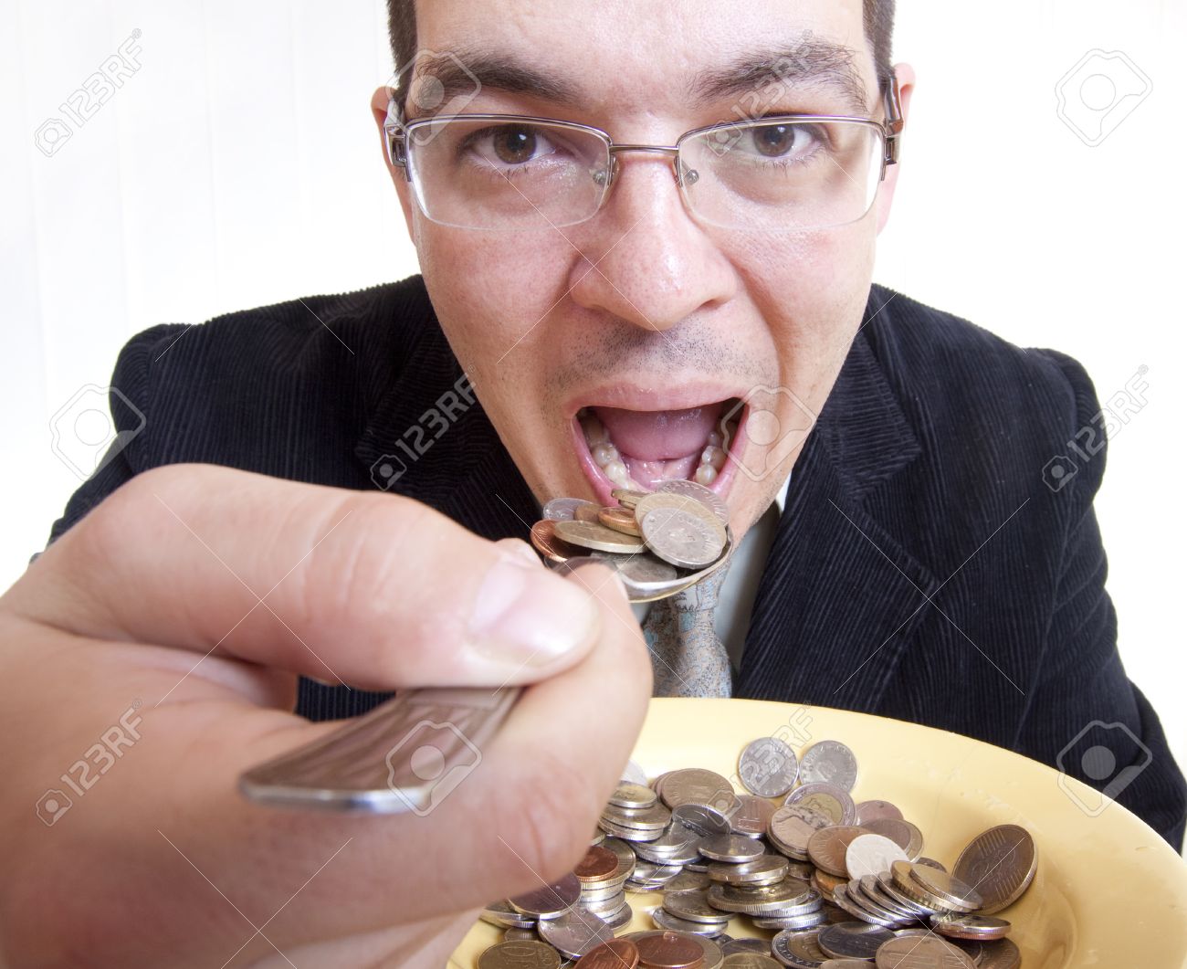 Funny Businessman Eating Money Stock Photo, Picture And Royalty Free Image. Image 13216933. Funny Businessman Eating Money Stock Photo, Picture And Royalty Free Image. Image 13216933.