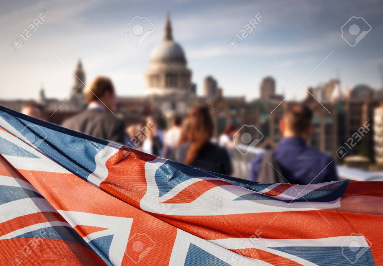 union jack flag and people walking on Millennium bridge at St Paul's cathedral - general elections, London, UK - 80016484 union jack flag and people walking on Millennium bridge at St Paul's cathedral - general elections, London, UK - 80016484