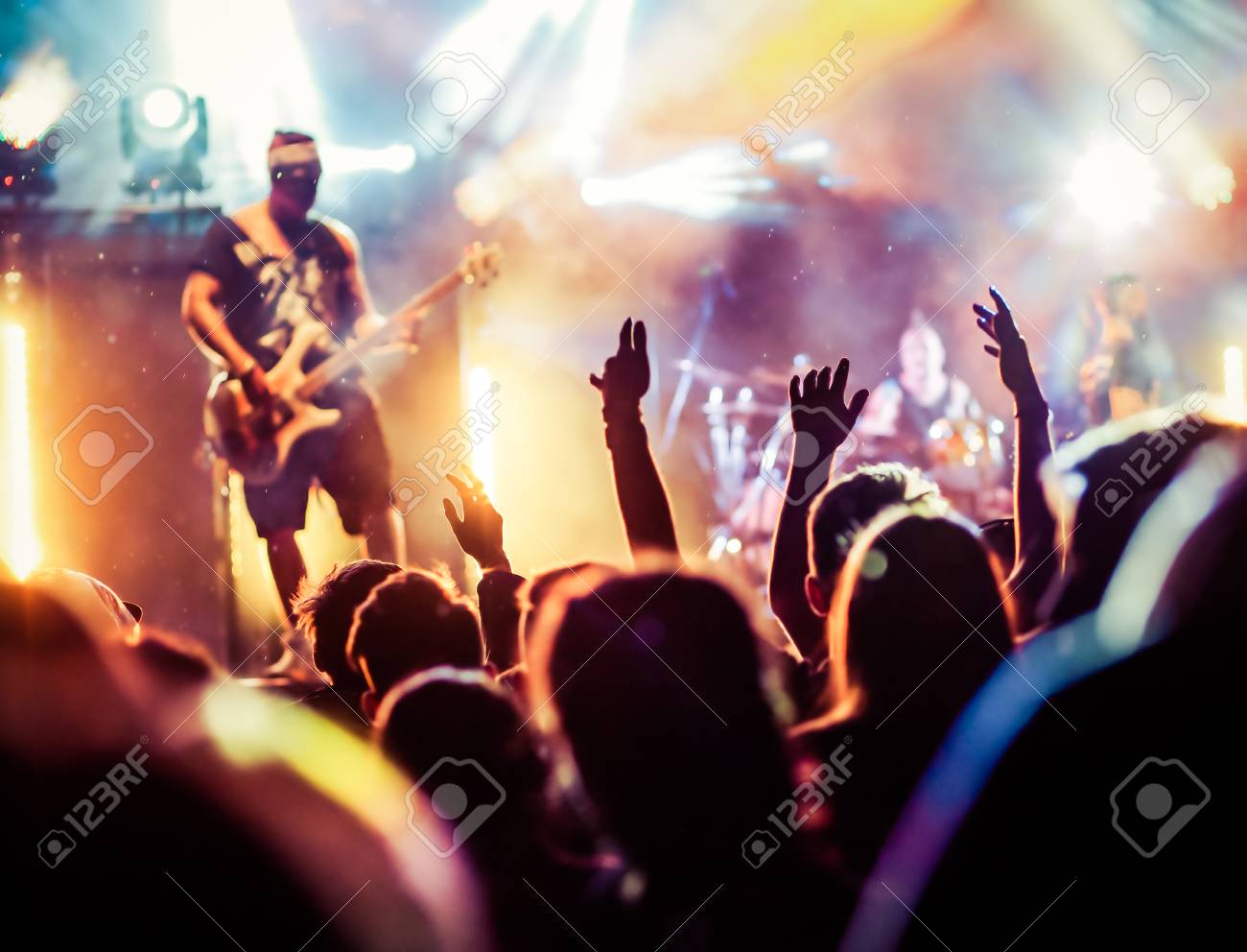 crowd with raised hands at concert - summer music festival - 82673098 crowd with raised hands at concert - summer music festival - 82673098