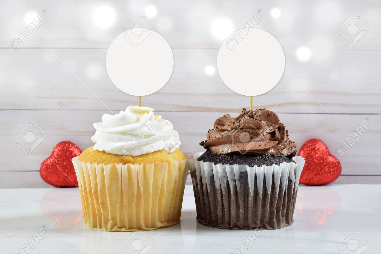 Download A Gourmet Chocolate And Vanilla Cupcake Rest Between Two Glittery Red Hearts In This Valentine Cupcake Topper Mockup Stock Photo Picture And Royalty Free Image Image 146074568