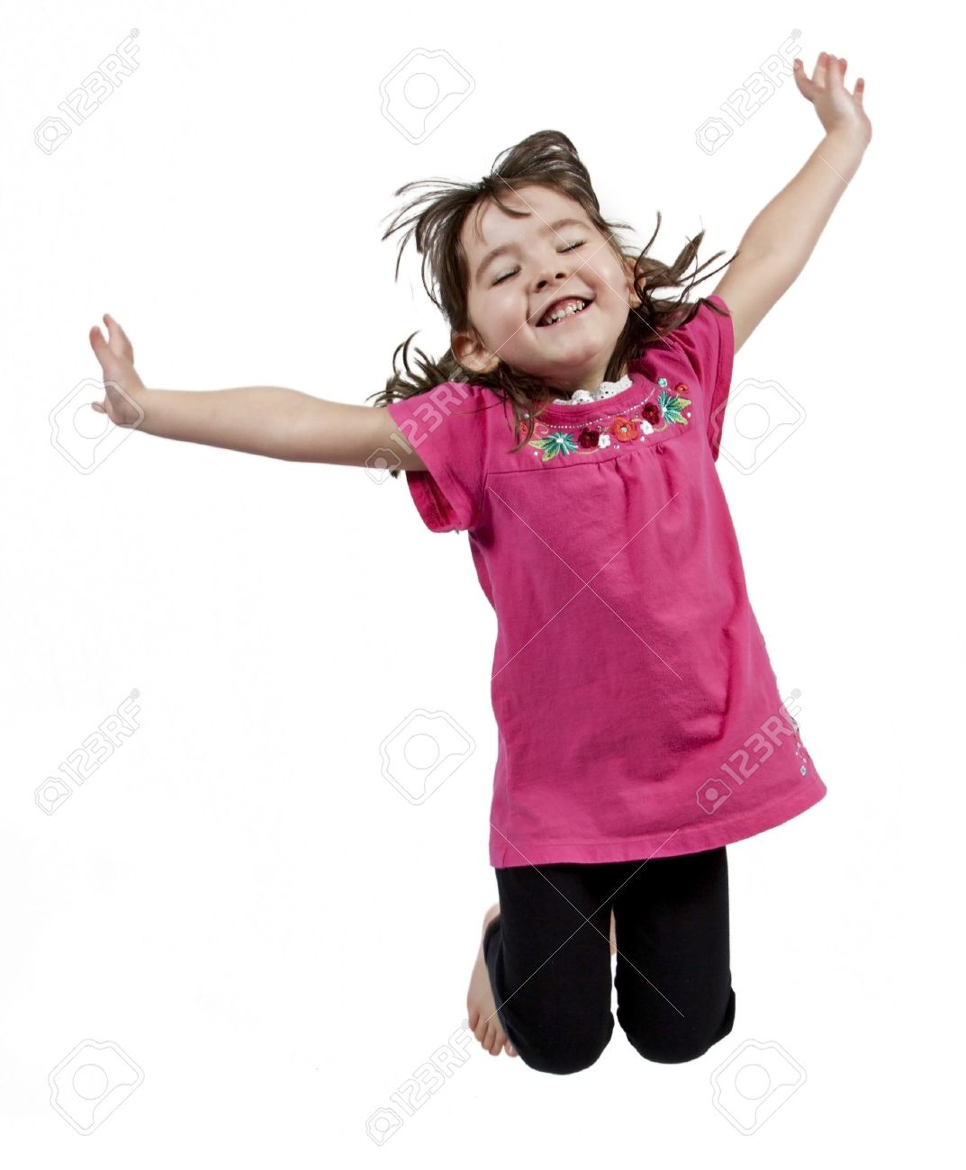 Adorable and happy little girl jumping in air. isolated on white background - 8951882 Adorable and happy little girl jumping in air. isolated on white background - 8951882