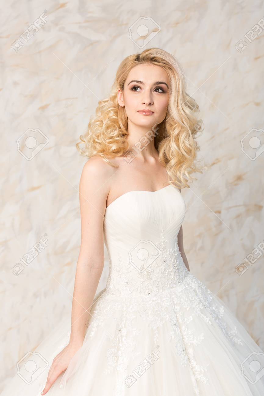 Fashionable White Gown Beautiful Blonde Model Bride Hairstyle