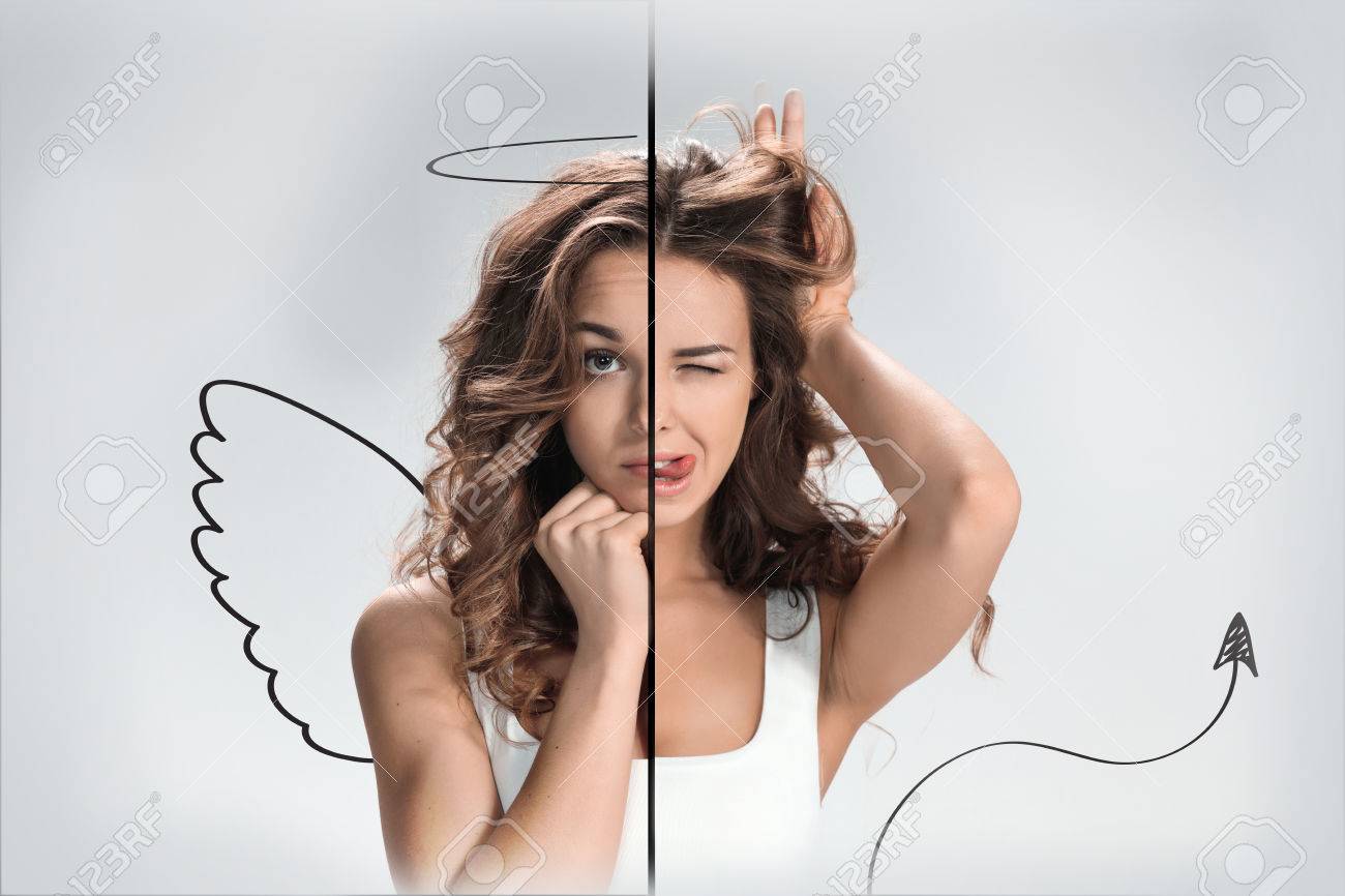 天使と悪魔の顔に別の感情を持つ少女の写真 コラージュ の写真素材 画像素材 Image