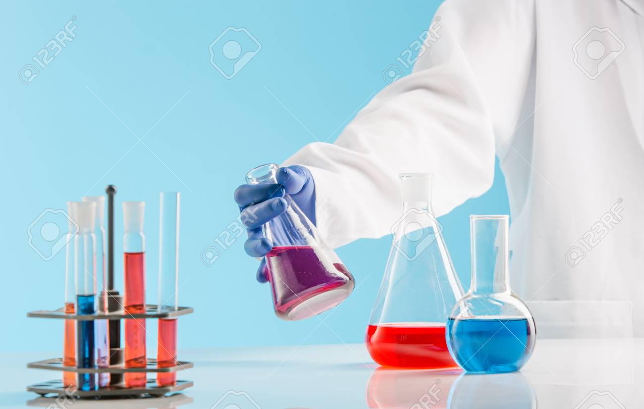 experiments in a chemistry lab conducting an experiment in the chemistry lab experiments