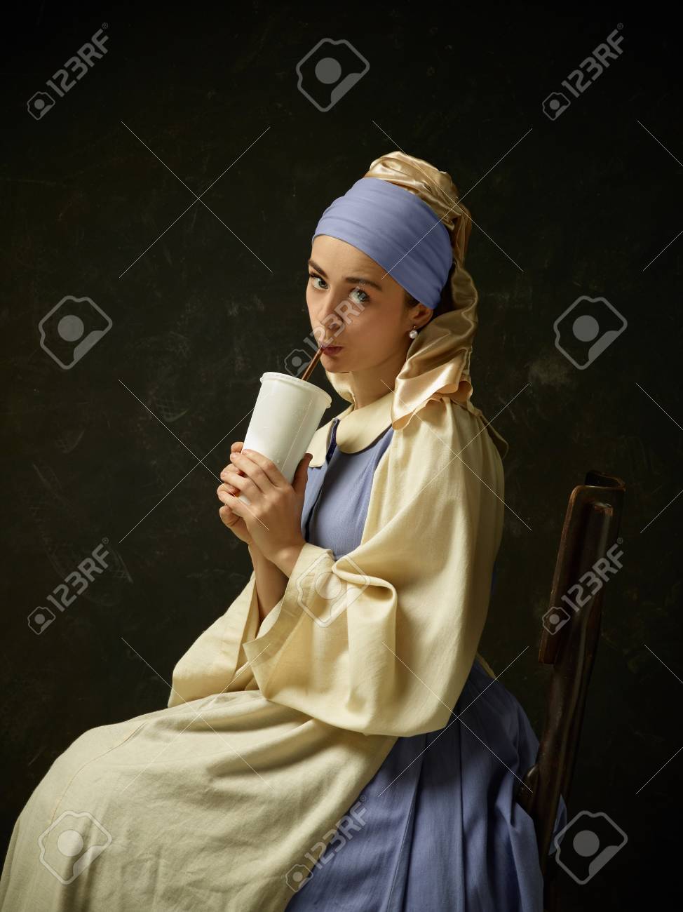 Medieval Woman In Historical Costume Wearing Corset Dress And Bonnet.  Beautiful Peasant Girl Wearing Thrush Costume With Cola Stock Photo,  Picture and Royalty Free Image. Image 111335539., image size:974x1300