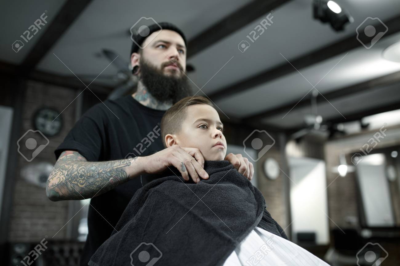 Children Hairdresser Cutting Little Boys Hair Contented Cute