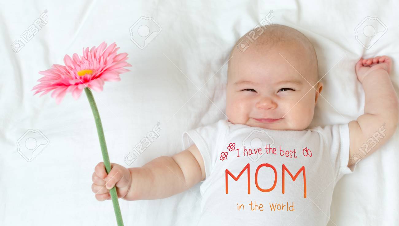 Mothers Day message with baby girl holding a flower - 98320933 Mothers Day message with baby girl holding a flower - 98320933