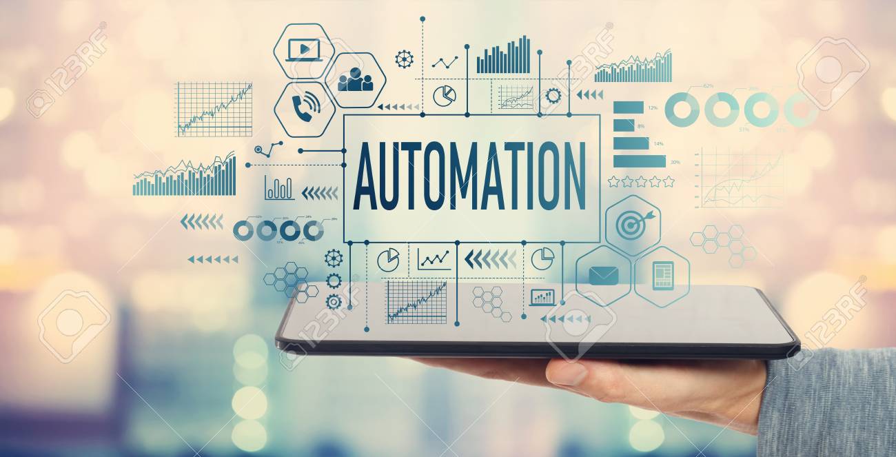 Automation with man holding a tablet computer - 110801236 Automation with man holding a tablet computer - 110801236