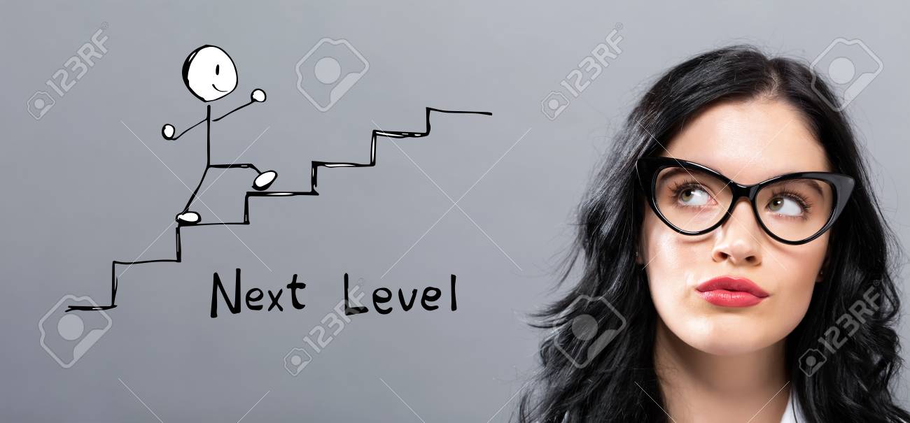 Next level concept with young businesswoman in a thoughtful face - 116208167 Next level concept with young businesswoman in a thoughtful face - 116208167