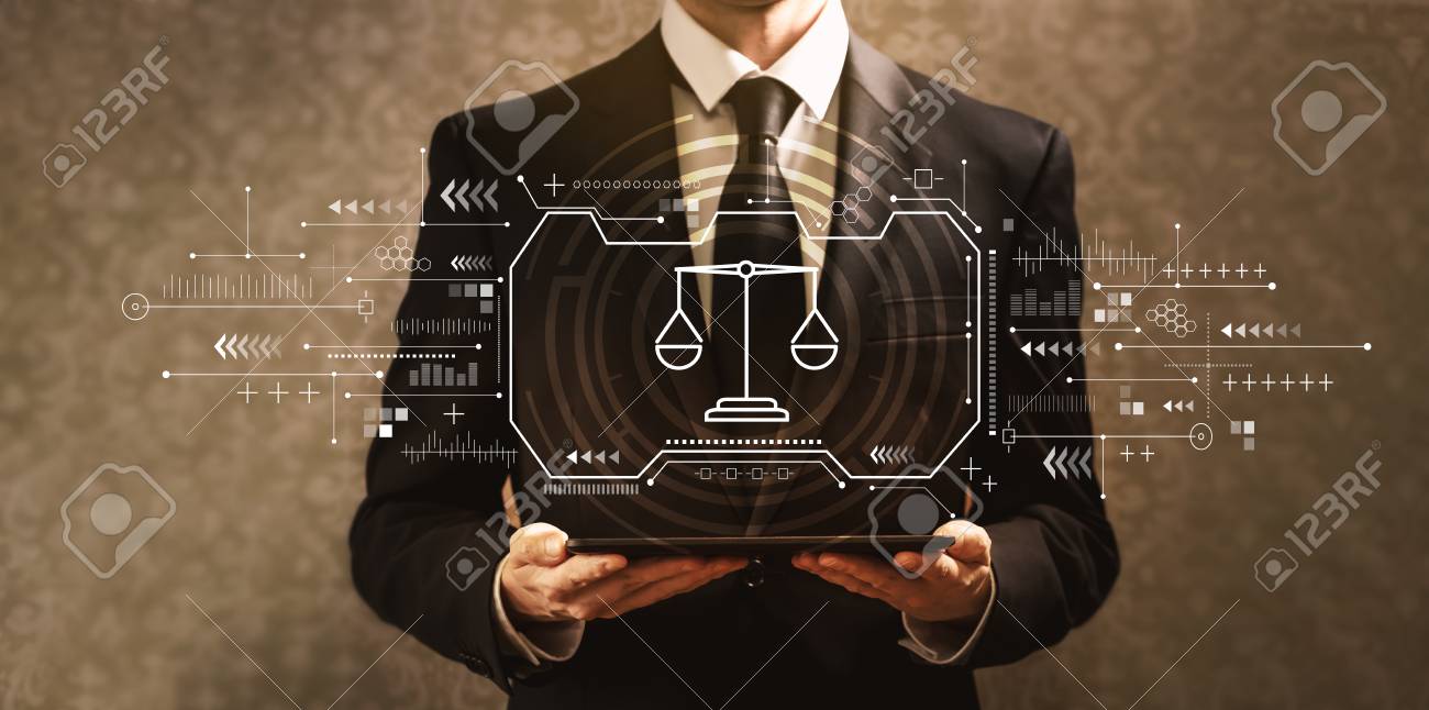 Justice theme with businessman holding a tablet computer - 121025417 Justice theme with businessman holding a tablet computer - 121025417