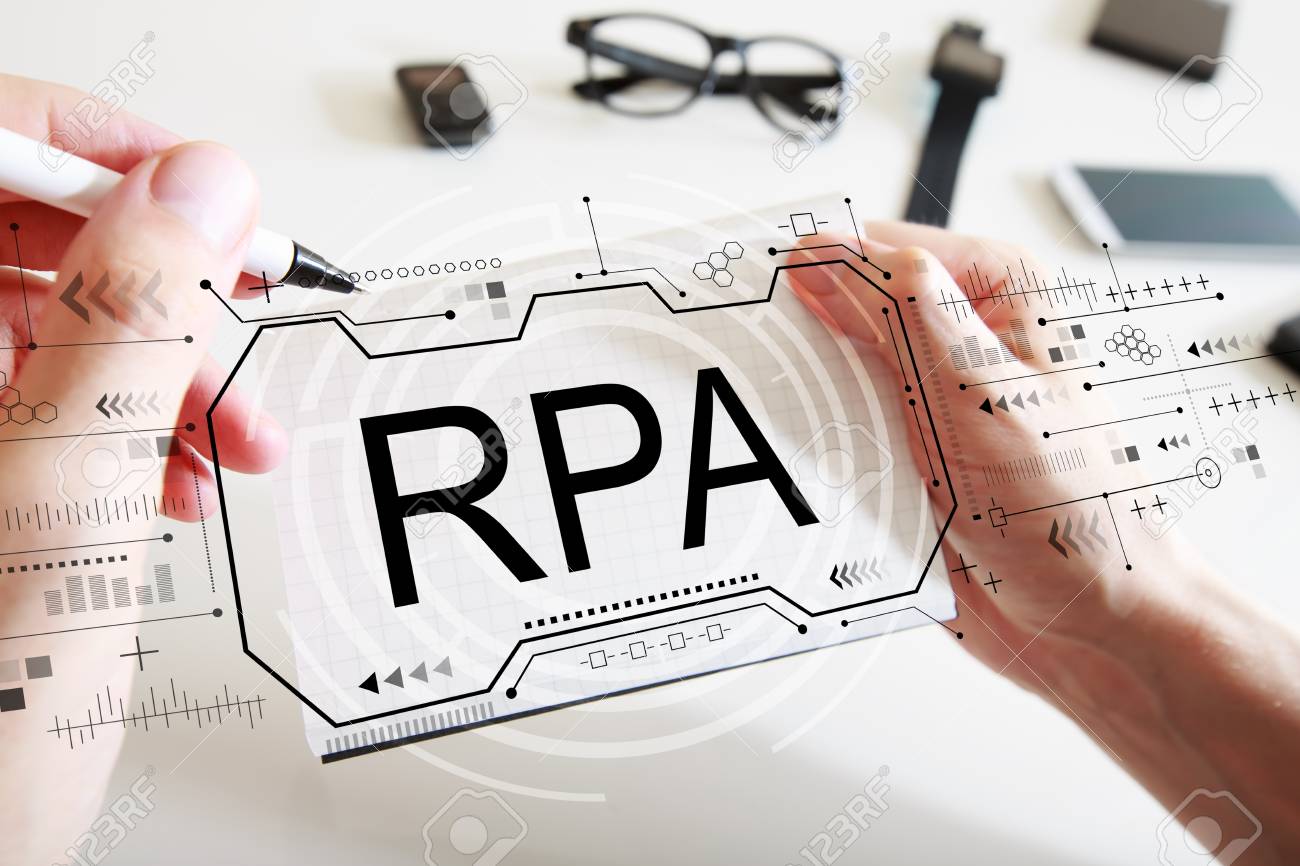 Robotic process automation concept with man writing in a notebook - 123825948 Robotic process automation concept with man writing in a notebook - 123825948