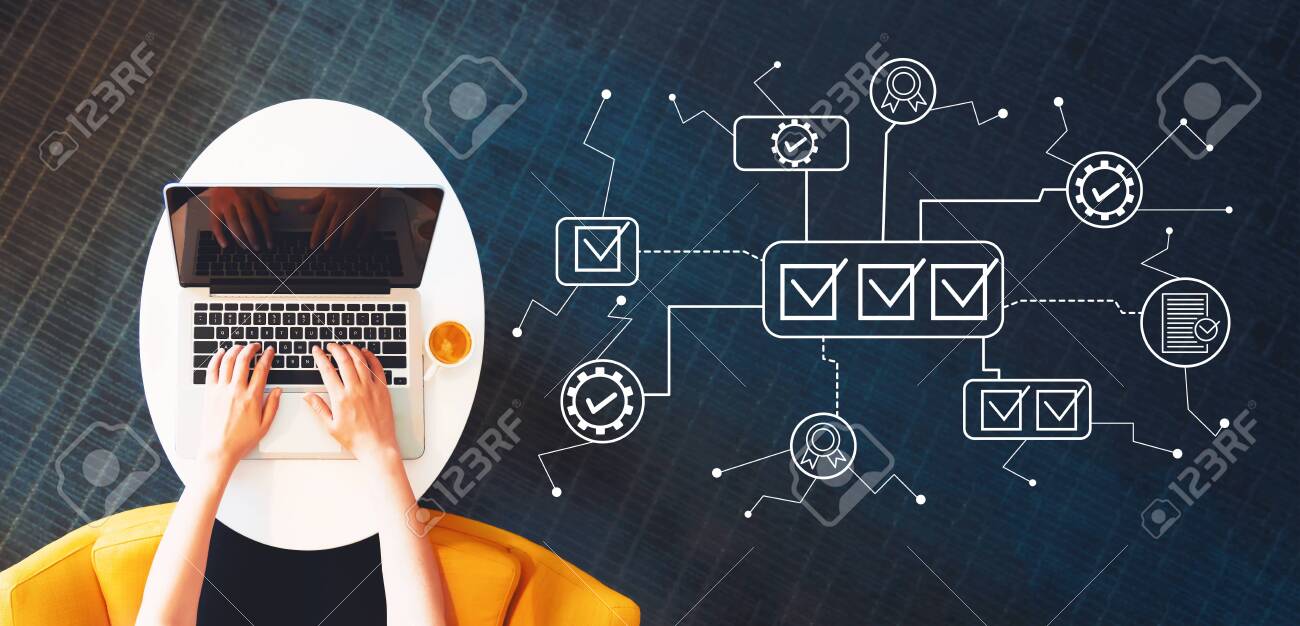 Quality control approval with person using a laptop on a white table - 125457198 Quality control approval with person using a laptop on a white table - 125457198