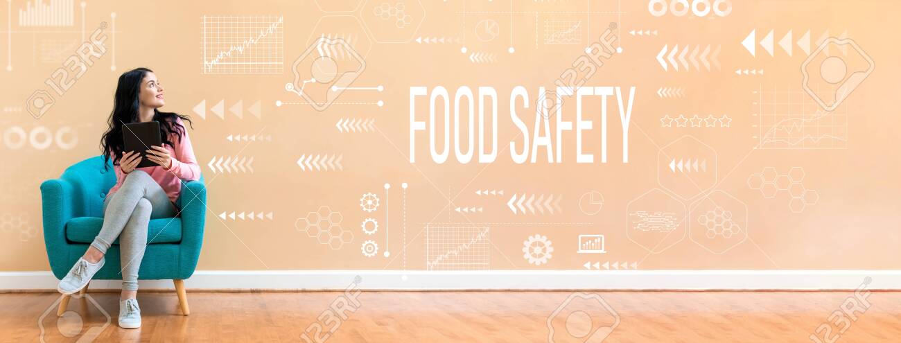 Food safety with young woman holding a tablet computer in a chair - 128758887 Food safety with young woman holding a tablet computer in a chair - 128758887