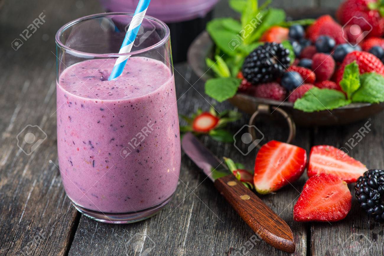 Homemade antioxidant summer fruits smoothie on rustic table - 40549455 Homemade antioxidant summer fruits smoothie on rustic table - 40549455