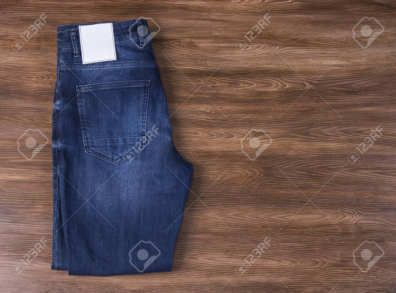 Download Jeans Label Mockup Denim Texture Isolated Wooden Background Stock Photo Picture And Royalty Free Image Image 132275511