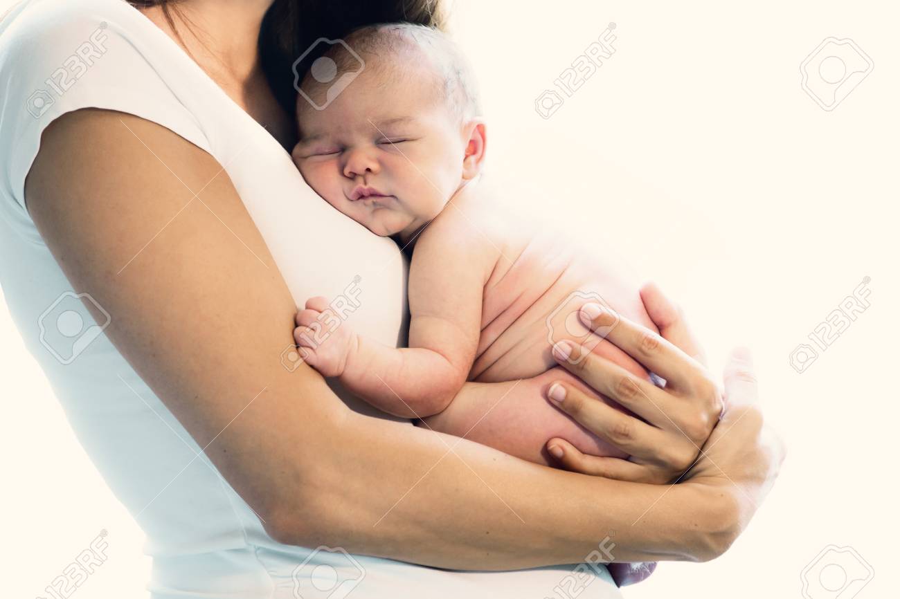 newborn sleeping on chest