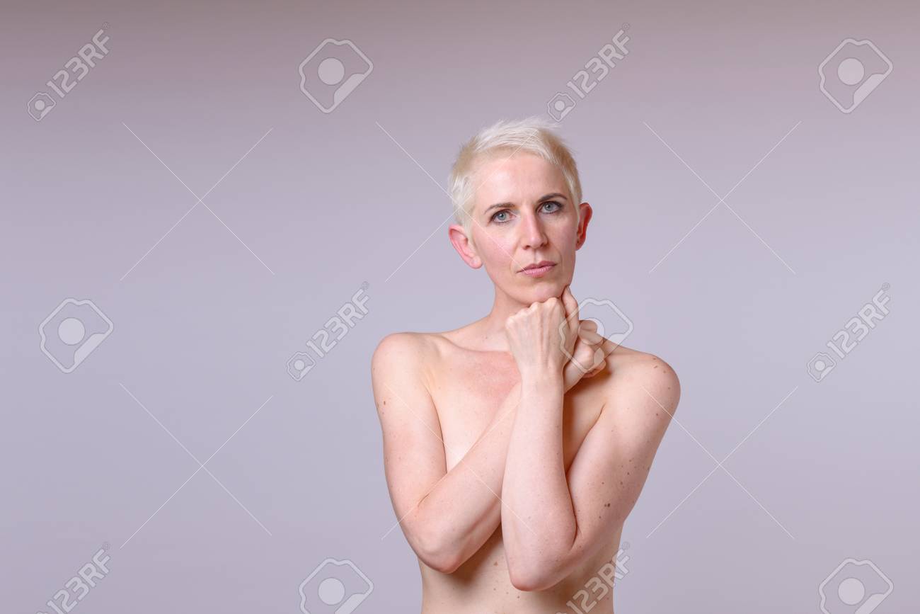 Michael HeimBeautiful Naked Mature Woman With A Thoughtful Look Stock Photo, Picture And Royalty Free Image image