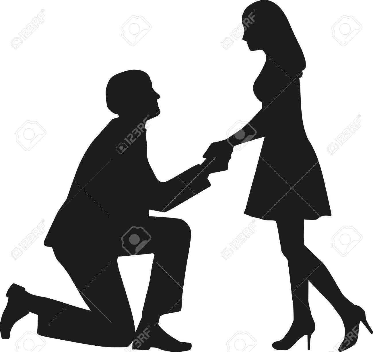 Proposal man on knees asking his wife to marry him - 53110578 Proposal man on knees asking his wife to marry him - 53110578