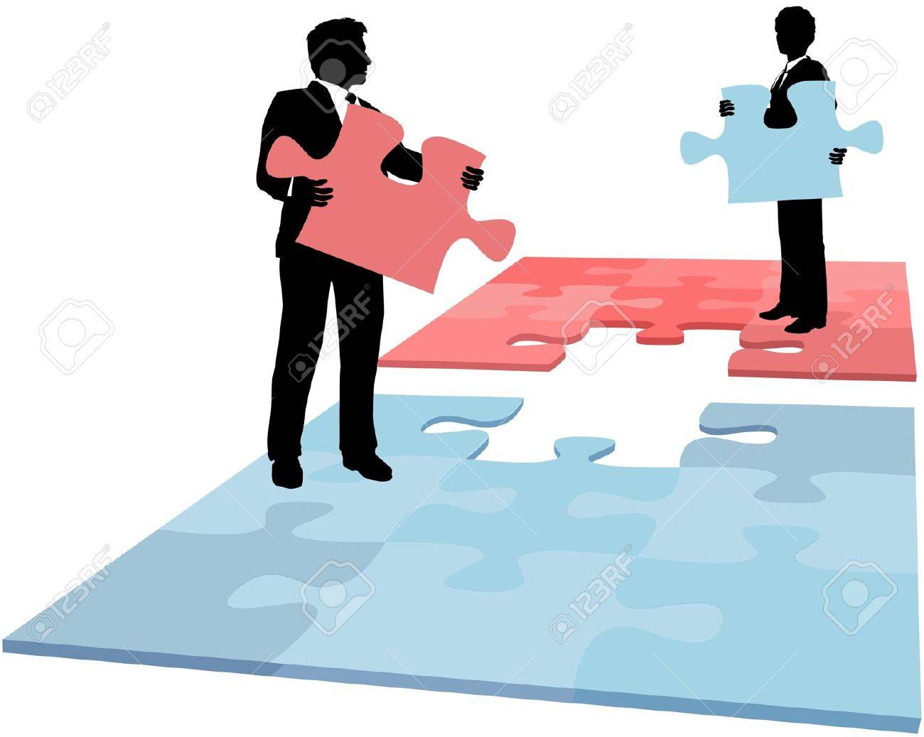 business people hold missing puzzle pieces needed for solution